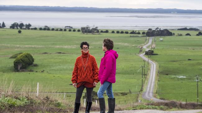 Montagu residents Colleen Murfitt (L) and Kim Anderson at Robbins Island passage off the northwest coast of Tasmania, the site of the proposed wind farm. Picture: Chris Crerar