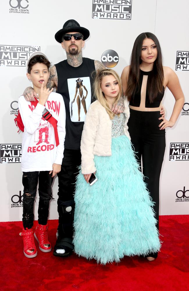 Landon Asher Barker, Recording artist Travis Barker, Alabama Luella Barker and Atiana de la Hoya attends the 2016 American Music Awards at Microsoft Theater on November 20, 2016 in Los Angeles, California. Picture: Getty