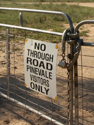 A locked gate at the Pinevale premises. Picture: Neil Keene