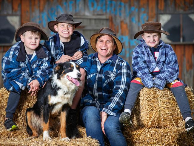 Melbourne show ambassador Shane Crawford with sons Harry, 7, Ben, 10, and Jack, 7. Picture: Mark Stewart