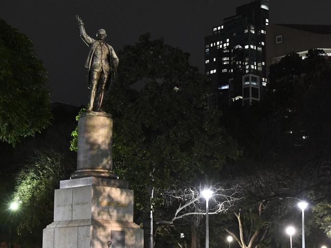 Captain Cook’s statue in Hyde Park, Sydney, has been under police guard against vandals. Picture: Gordon McComiskie