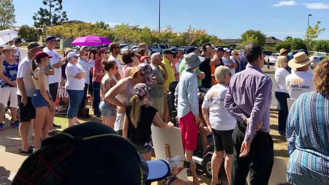 More than 100 people turned out at a peaceful protest on Sunday, November 25 against the sale of North Lakes Golf Course to a developer.