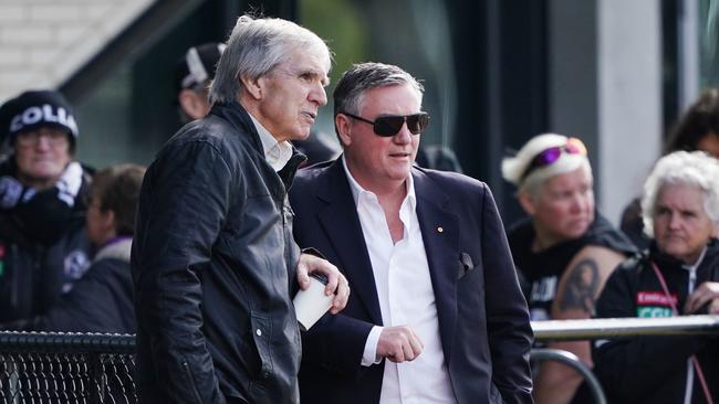 Former Collingwood champ Peter McKenna (left) is seen with former Magpies President Eddie McGuire. Picture: AAP Image/Michael Dodge