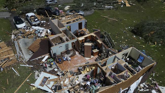 A home is destroyed after a severe storm passed the area on Saturday, May 17, 2025 in London, Ky. (AP Photo/Carolyn Kaster)