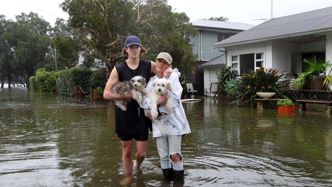 Deb Bulgin with her son Abe in their front yard at Narrabeen on Sydney’s northern beaches yesterday. Picture: Hollie Adams