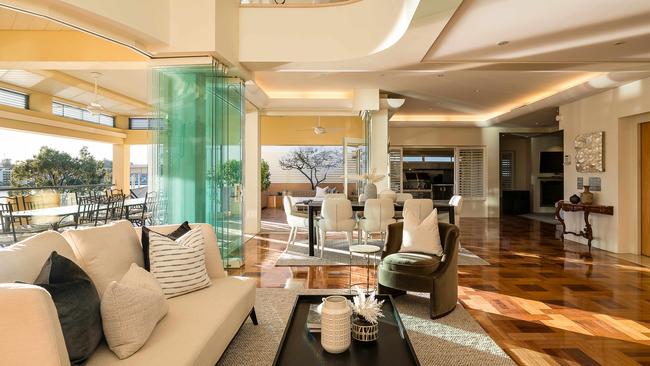 The Brisbane riverfront home displays modern glamour and good taste.