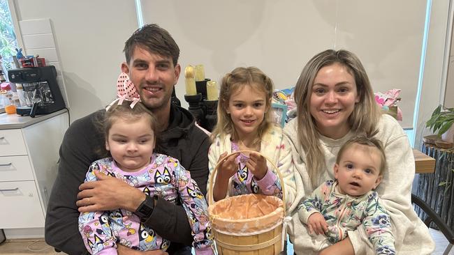 Koa Gibson, front left, has a congenital brain abnormality among other severe health conditions. Her family, including dad Ben, mum Aleisha, big sister Ava and little sister Sky, are appealing for continued NDIS support in the final months of Koa’s life. Picture: Supplied.