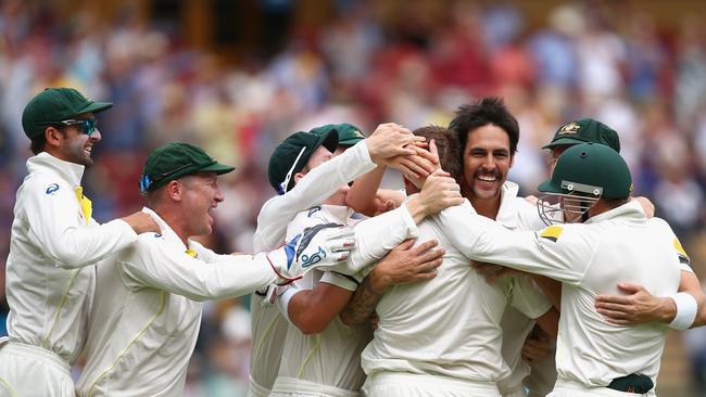 Mitchell Johnson celebrates after taking the wicket of England’s Alastair Cook England on day four of the Second Ashes Test Match between Australia and England at Adelaide Oval on December 8, 2013 in Adelaide. Photo: Ryan Pierse/Getty Images.