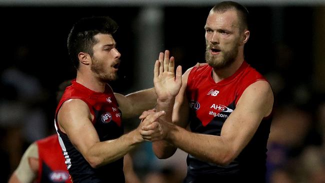 Alex Neal-Bullen and Max Gawn celebrate a goal.