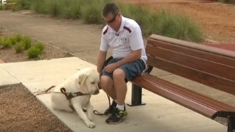 David Gearin, with his beloved labrador Odin after the attack. Picture: 7 News