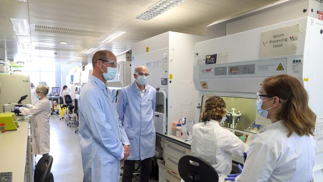 Prince William, The Duke of Cambridge, meets scientists during a visit to the manufacturing laboratory where a vaccine against COVID-19 is being developed at the Oxford Vaccine Group's facility at the Churchill Hospital on June 24.