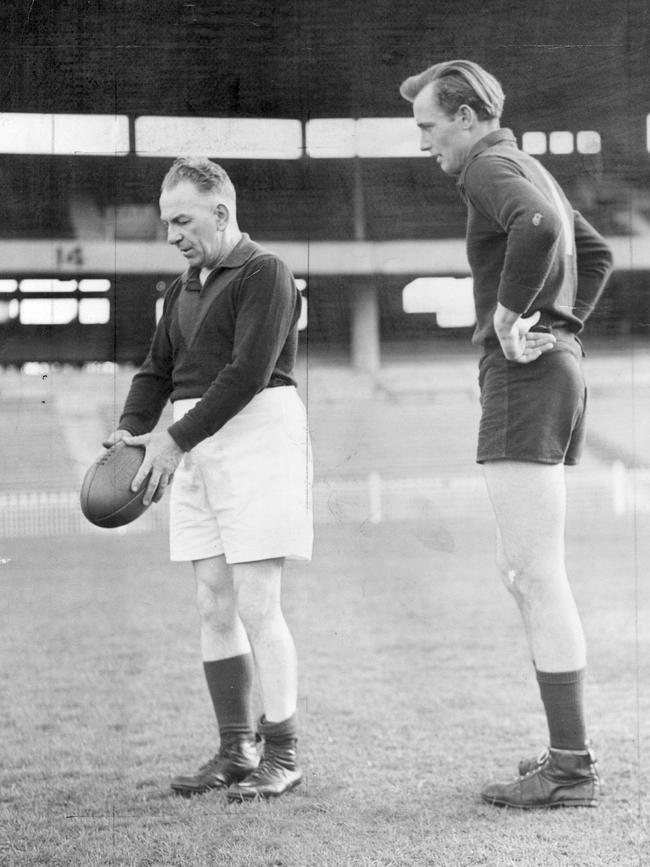 Melbourne coach ‘Checker’ Hughes with Denis Cordner during training before the 1948 Grand Final replay against Essendon. Picture: Frank Hughes
