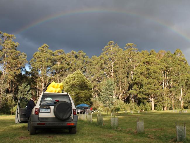 A rainbow appears over a campground at River’s Edge Wilderness Camping at Lonnavale. Picture: Tourism Tasmania &amp; Kathryn Leahy