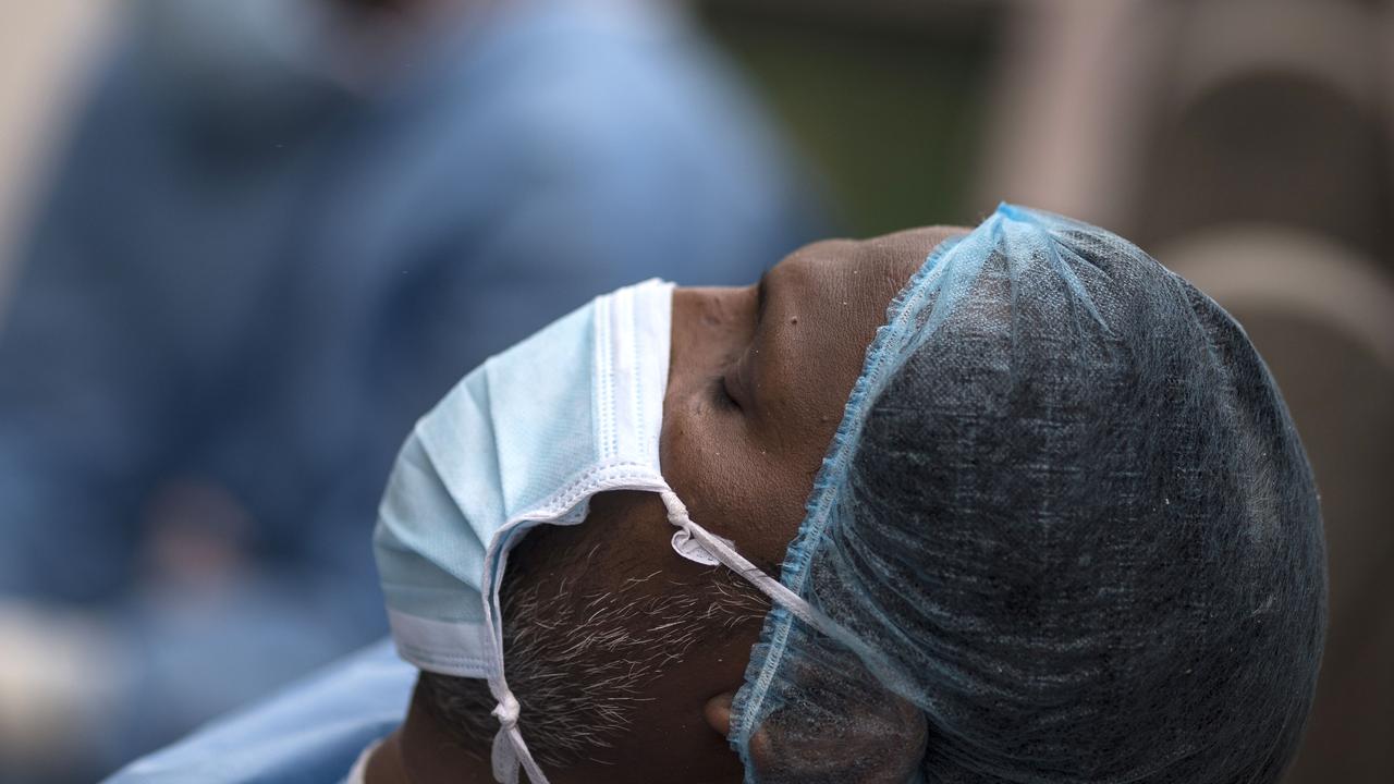 A healthcare worker in India as the country is in the grips of a crisis. Picture: Anindito Mukherjee/Getty Images