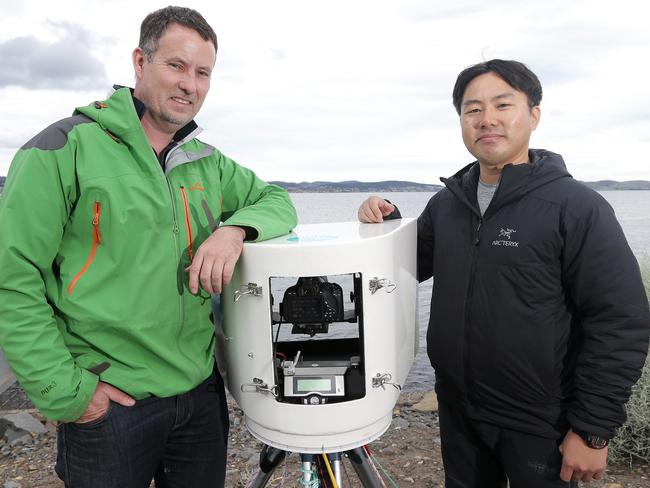 Tasmanian Dr Tim Lynch and his Korean counterpart Dr Jin Woo Jung. Picture: LUKE BOWDEN