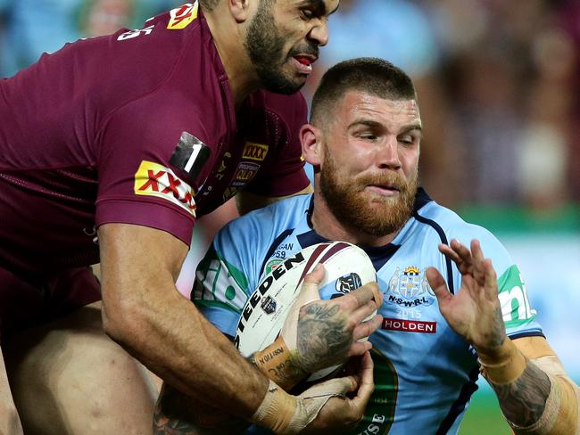 Josh Dugan tackled by Greg Inglis during Origin Game 3 between New South Wales and Queensland at Suncorp Stadium .Picture Gregg Porteous