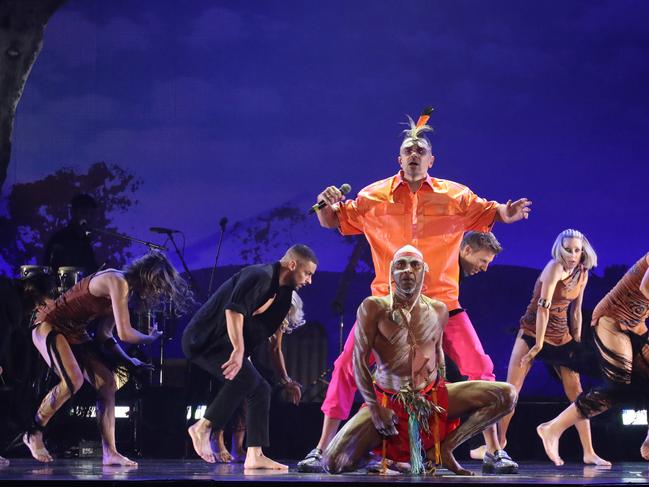 Mitch Tambo (in orange) performing Burn the Floor at The Palms. Picture: David Crosling