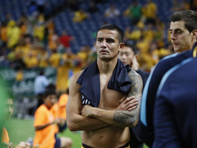 Australia's Tim Cahill looks dejected after the loss to Japan.