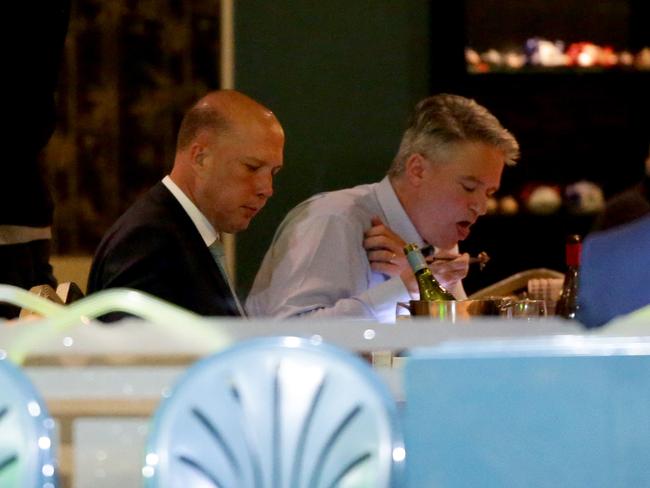 Peter Dutton and his most senior ally in the coup, Mathias Cormann, were out at dinner in Canberra on Thursday instead of working the phones. Picture: Jonathan Ng