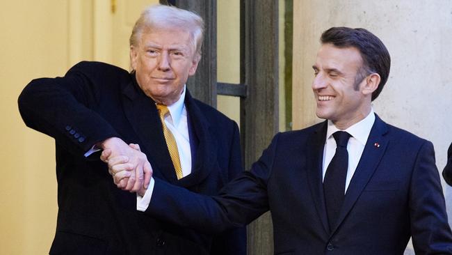 PARIS, FRANCE - DECEMBER 7: French President Emmanuel Macron meets with President-Elect Donald Trump at the Elysee Palace on December 7, 2024 in Paris, France. Donald Trump was among the wave of foreign dignitaries descending on Paris this weekend to attend a reopening ceremony at Notre-Dame Cathedral, more than five years after it was damaged in a major fire. (Photo by Oleg Nikishin/Getty Images)