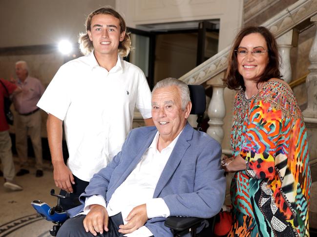 John Connolly with his wife Jo & son Jesse (left), ahead of a rugby event where he is receiving a Hall of Fame award, from the Reds, Brisbane City Hall, on Friday 14th February 2025 - Photo Steve Pohlner