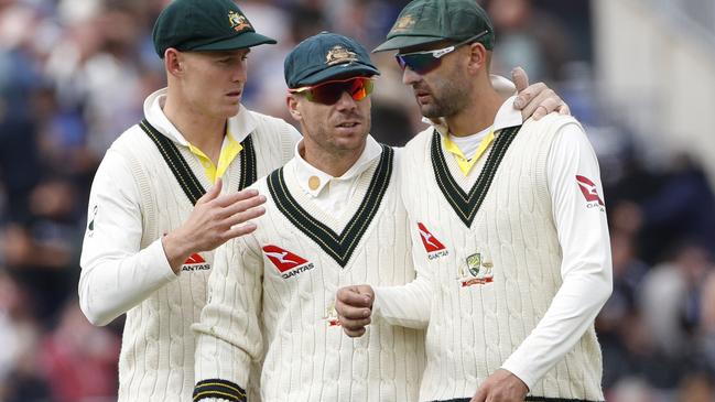 Team-mates put a metaphorical and literal arm round Nathan Lyon’s shoulders on a tough day.