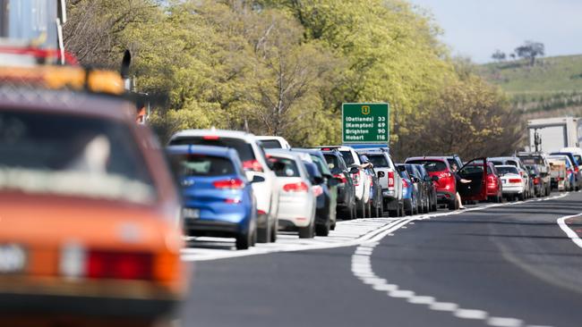 Traffic backed up on the Midland Highway near Ross after a fatal car crash involving multiple cars and victims.