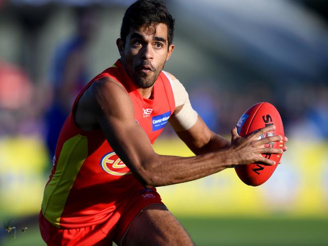 Jack Martin of the Suns runs with the ball during the Round 7 AFL match between the Western Bulldogs and the Gold Coast Suns at Mars Stadium in Ballarat, Victoria, Saturday, May 5, 2018. (AAP Image/Joe Castro) NO ARCHIVING, EDITORIAL USE ONLY