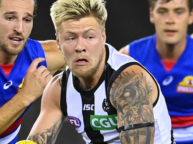 MELBOURNE, AUSTRALIA - MARCH 20: Jordan De Goey of the Magpies breaks free of the centre during the round 1 AFL match between the Western Bulldogs and the Collingwood Magpies at Marvel Stadium on March 20, 2020 in Melbourne, Australia. (Photo by Quinn Rooney/Getty Images via AFL Photos)