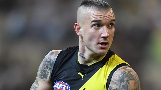 Dustin Martin of the Tigers is seen in action during the Round 20 AFL match between the Melbourne Demons and the Richmond Tigers at the MCG in Melbourne, Saturday, August 3, 2019.  (AAP Image/Julian Smith) NO ARCHIVING, EDITORIAL USE ONLY