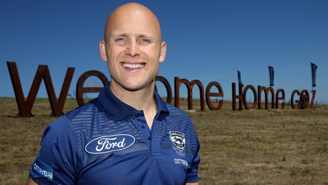 Geelong Cats star Gary Ablett with his ‘Welcome home Gaz’ sign. Picture: Mike Dugdale