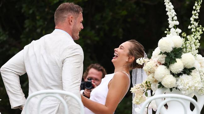 Wet weather did not dampen the joy of Tahlia Giumelli and Tom Burgess at their wedding on Friday afternoon. Picture: Matrix