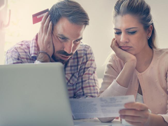 A couple having problems with their bills and money including credit card debt. Picture: iStock.