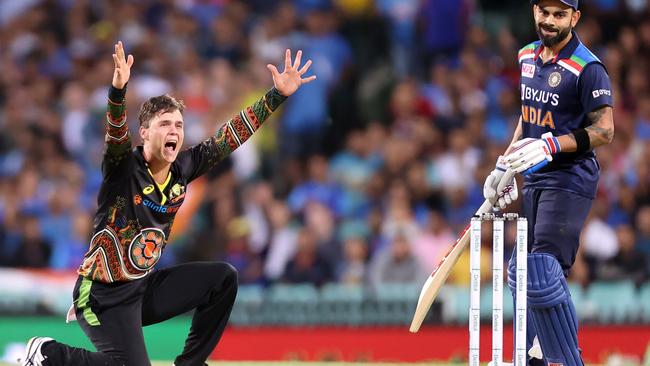 Mitchell Swepson unsuccessfully appeals for the wicket of India's captain Virat Kohli at the SCG on Tuesday night. Picture: AFP