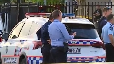 Police at the scene of the fatal shooting in Townsville. Picture: 7 News