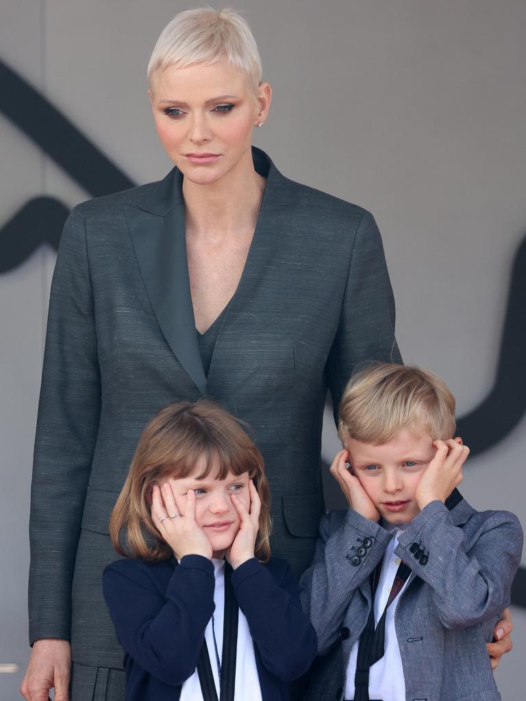 Princess Charlene stood behind her children, Princess Gabriella and Prince Jacques. Picture: Getty Images.