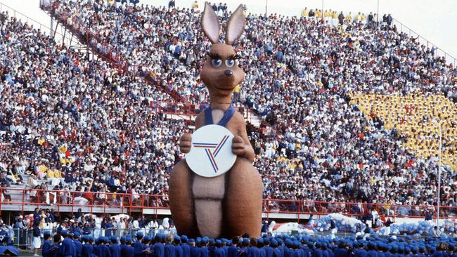 The 1982 Brisbane Commonwealth Games’ mascot, Matilda the kangaroo, glides around the track at the opening ceremony at QEII stadium. Picture: News Corp