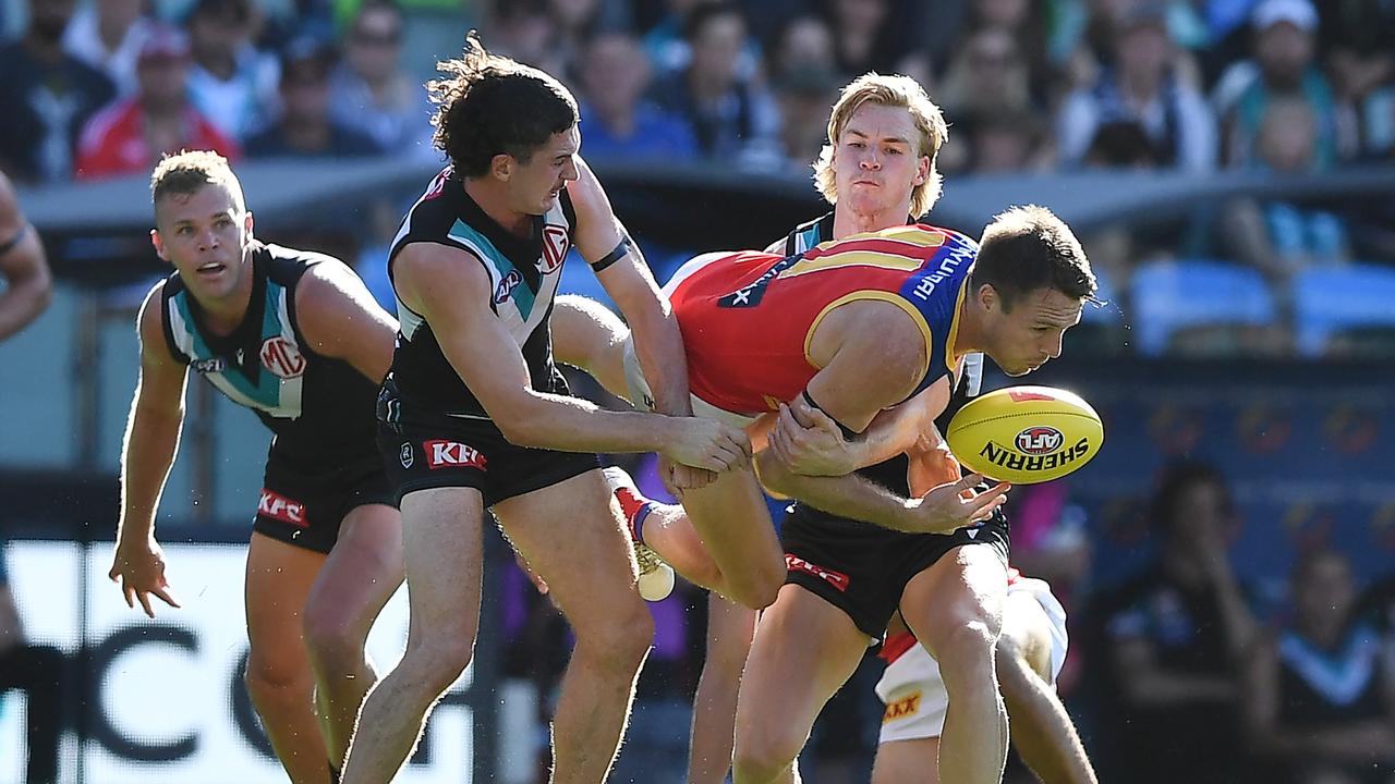 Darcy Byrne-Jones and Miles Bergman in the Port-Brisbane clash in round 1. (Photo by Mark Brake/Getty Images)