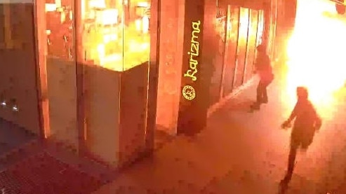 Police have released fresh CCTV of the moment arsonists firebombed a Docklands restaurant. Picture: Victoria Police