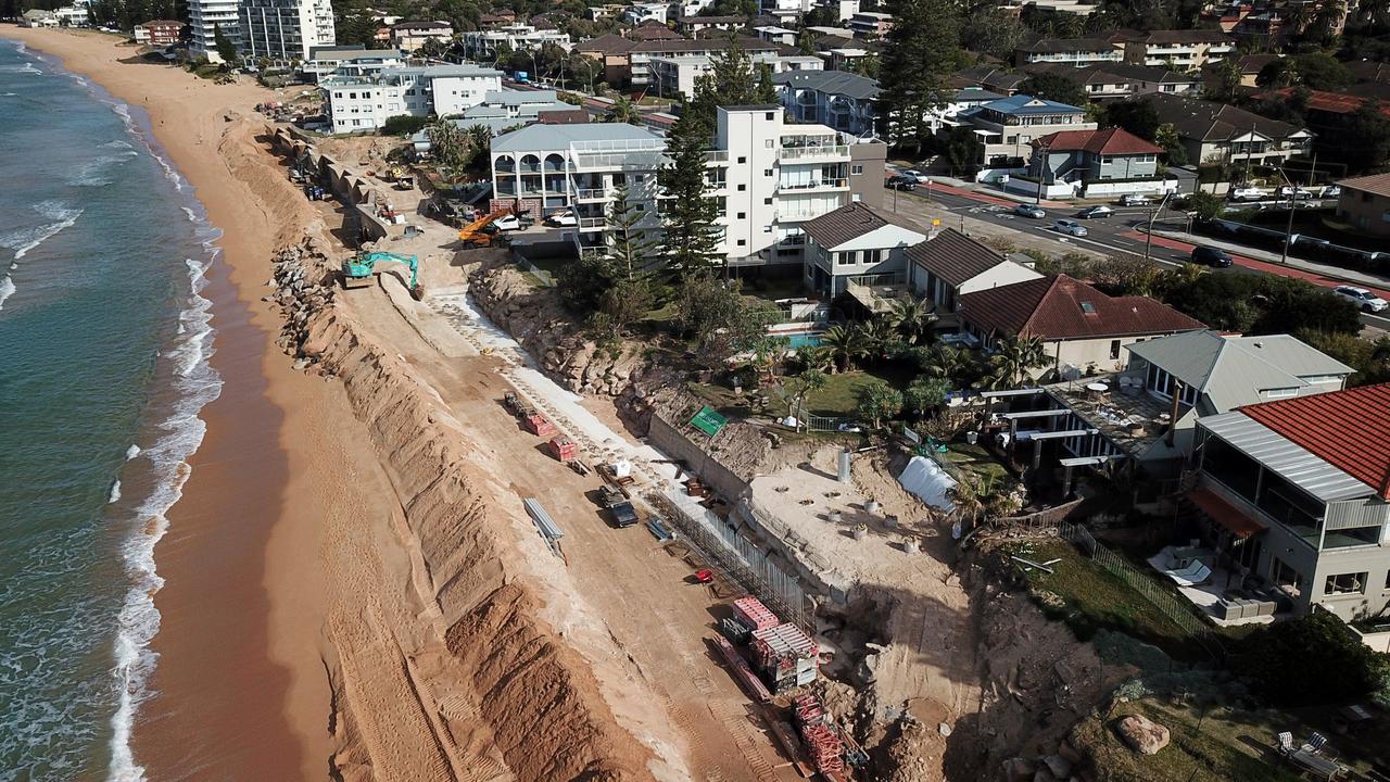 The sea wall currently under construction only protects certain homes who have managed to agree on funding it. Picture: Jonathan Ng