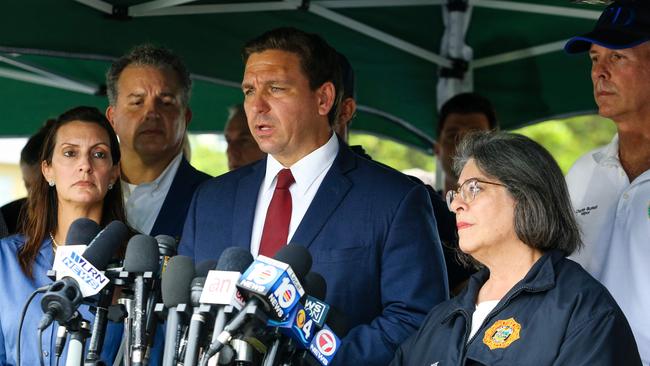 Ron DeSantis, centre, has hitherto been seen as an ally of the former president. Picture: AFP