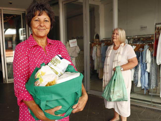 Wendy Harper (left) and Leonie Leonard have started picking up groceries to help those in need. Picture: Sam Ruttyn