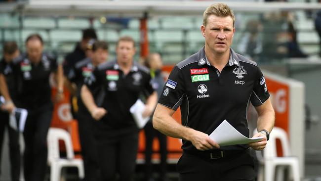 Nathan Buckley marches out to the huddle at three-quarter time. Picture: Wayne Ludbey