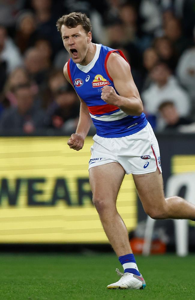 Jack Macrae of the Bulldogs celebrates a goal against Collingwood. Picture: Michael Willson/AFL Photos via Getty Images.