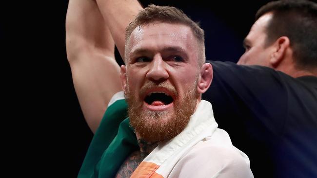 Conor McGregor of Ireland celebrates his KO victory over Eddie Alvarez.
