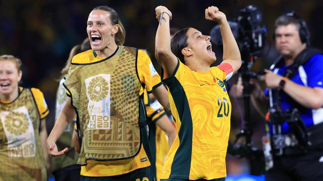 Sam Kerr and Emily van Egmond are delighted after the penalty shootout win Picture: Adam Head