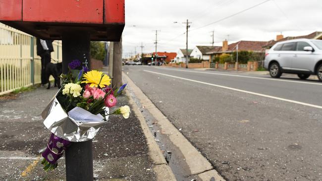 Flowers were left at the scene where Peter McGuffie was struck and killed. Picture: David Smith