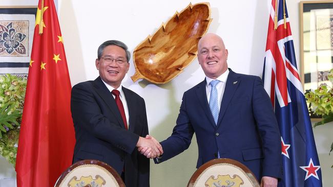 Mr Li with New Zealand Prime Minister Christopher Luxon in Wellington. Picture: Getty Images