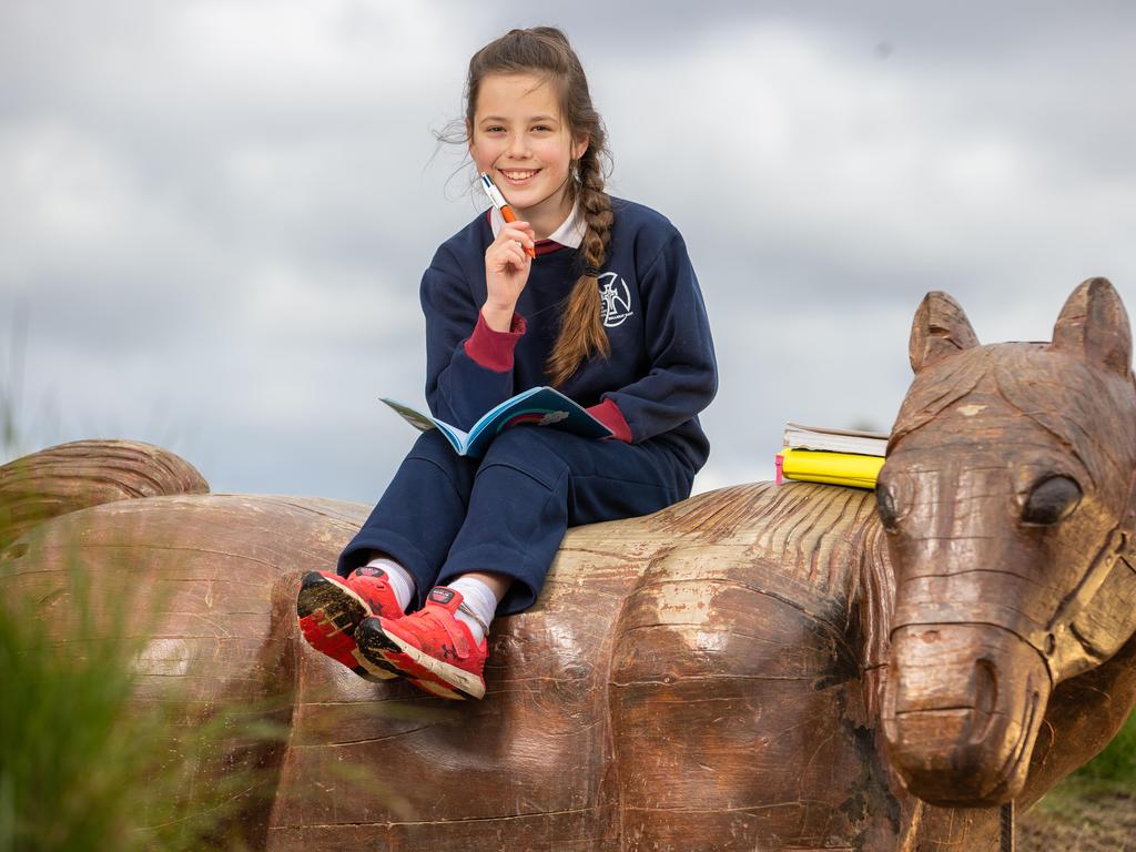 Grade 4 student Olivia Green, 9yo, pictured in Eureka Stockade Gardens, Ballarat East is preparing to enter the Kids News Short Story Competition again this year after scoring a Highly Commended for her story, Covid Cooking, last year. Picture: Jason Edwards