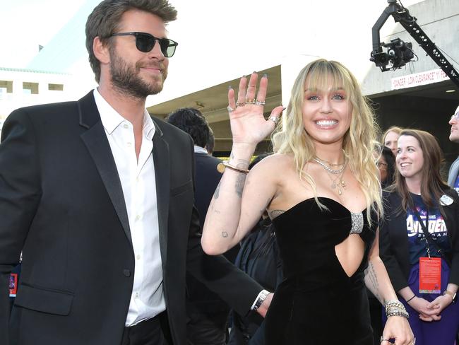 Miley and Liam when they were a power couple. (Photo by Amy Sussman/Getty Images)